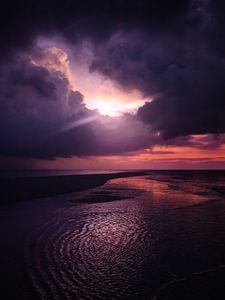 Preview wallpaper sun, rays, sky, coast, dusk