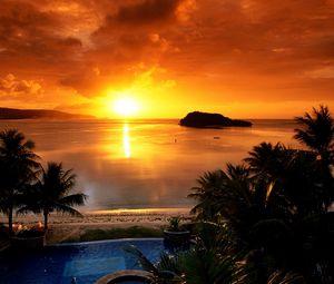 Preview wallpaper sun, sea, decline, horizon, evening, coast, pool, palm trees
