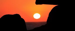 Preview wallpaper sun, sunset, cliffs, dark