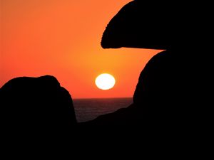 Preview wallpaper sun, sunset, cliffs, dark