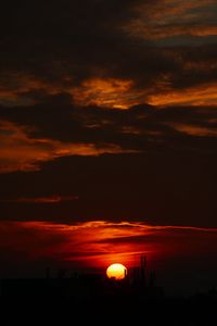 Preview wallpaper sun, sunset, clouds, building, dark