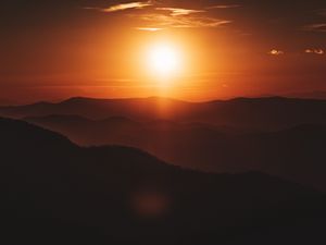 Preview wallpaper sun, sunset, hills, sky, dark