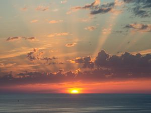 Preview wallpaper sun, sunset, horizon, sea, clouds