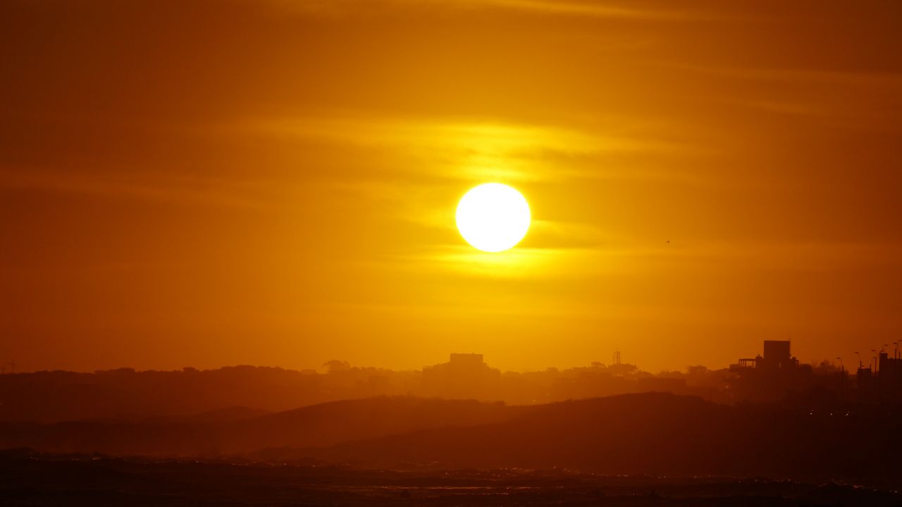 Wallpaper sun, sunset, horizon, water, dark