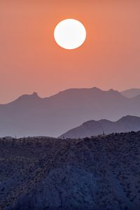 Preview wallpaper sun, sunset, mountains, hills, fog