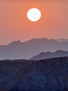 Preview wallpaper sun, sunset, mountains, hills, fog