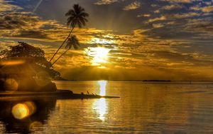 Preview wallpaper sun, sunset, reflections, palm, island, bungalow