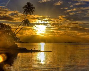 Preview wallpaper sun, sunset, reflections, palm, island, bungalow