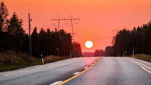 Preview wallpaper sun, sunset, road, trees