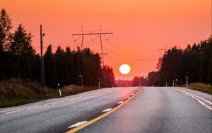 Preview wallpaper sun, sunset, road, trees