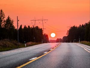 Preview wallpaper sun, sunset, road, trees