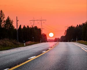 Preview wallpaper sun, sunset, road, trees