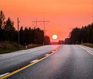 Preview wallpaper sun, sunset, road, trees