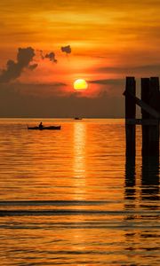 Preview wallpaper sun, sunset, sea, boats, pier