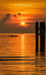 Preview wallpaper sun, sunset, sea, boats, pier