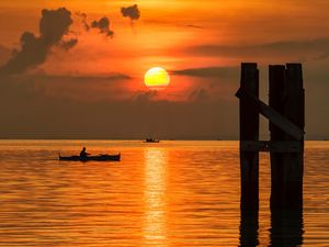 Preview wallpaper sun, sunset, sea, boats, pier