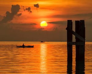 Preview wallpaper sun, sunset, sea, boats, pier