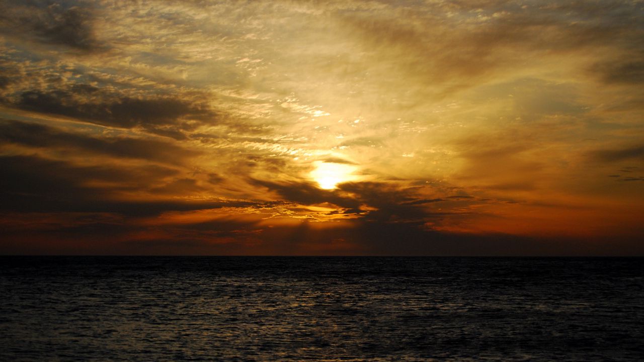 Wallpaper sun, sunset, sea, clouds, landscape, dark