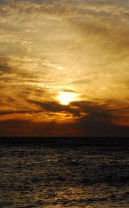 Preview wallpaper sun, sunset, sea, clouds, landscape, dark