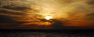 Preview wallpaper sun, sunset, sea, clouds, landscape, dark