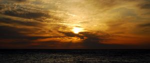 Preview wallpaper sun, sunset, sea, clouds, landscape, dark