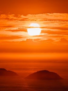 Preview wallpaper sun, sunset, sky, hills, clouds