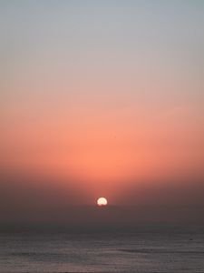 Preview wallpaper sun, sunset, sky, sea, pink