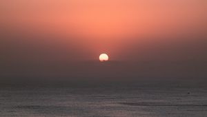 Preview wallpaper sun, sunset, sky, sea, pink