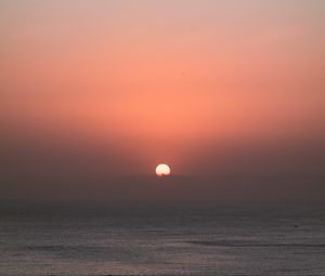Preview wallpaper sun, sunset, sky, sea, pink