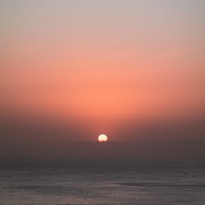 Preview wallpaper sun, sunset, sky, sea, pink