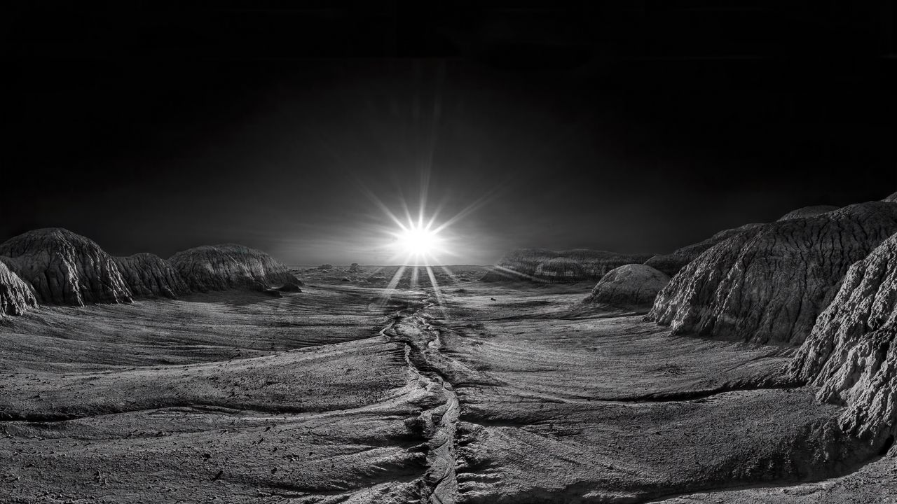 Wallpaper sundawn, rays, shine, flash, stone, desert, landscape, bw