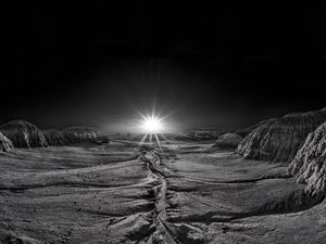 Preview wallpaper sundawn, rays, shine, flash, stone, desert, landscape, bw