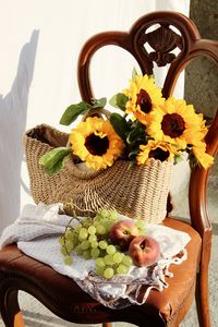 Preview wallpaper sunflowers, grapes, peach, basket, chair, flowers