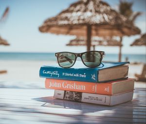 Preview wallpaper sunglasses, books, beach, sun