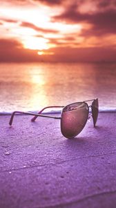 Preview wallpaper sunglasses, glasses, sea, sunset