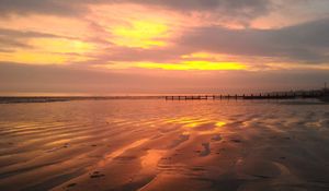 Preview wallpaper sunset, beach, pier, evening, sea