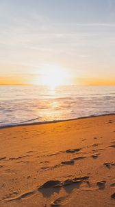 Preview wallpaper sunset, beach, sea, sand, water