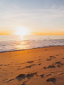 Preview wallpaper sunset, beach, sea, sand, water
