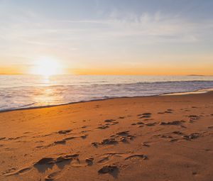 Preview wallpaper sunset, beach, sea, sand, water