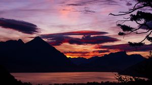 Preview wallpaper sunset, branches, sky, clouds, mountains
