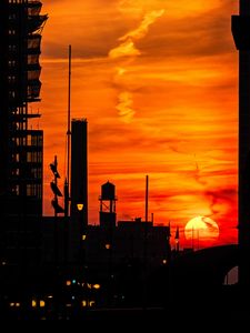 Preview wallpaper sunset, buildings, silhouettes, sky