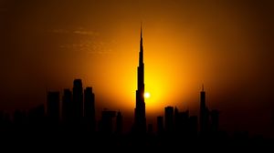 Preview wallpaper sunset, city, building, silhouette