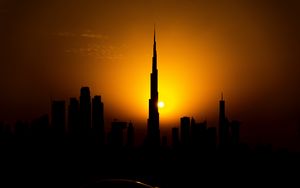 Preview wallpaper sunset, city, building, silhouette
