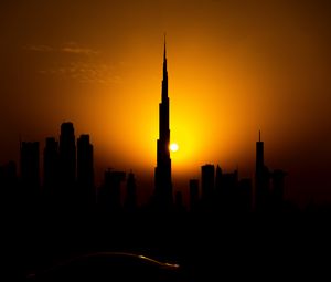 Preview wallpaper sunset, city, building, silhouette
