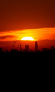 Preview wallpaper sunset, city, buildings, dark, dusk