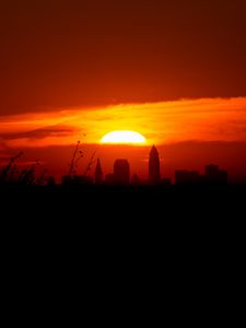 Preview wallpaper sunset, city, buildings, dark, dusk