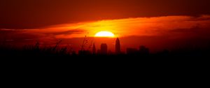 Preview wallpaper sunset, city, buildings, dark, dusk