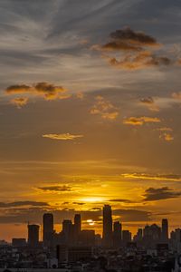 Preview wallpaper sunset, city, buildings, dusk, view