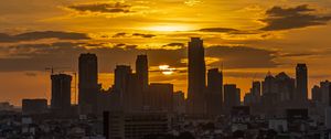 Preview wallpaper sunset, city, buildings, dusk, view