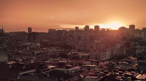 Preview wallpaper sunset, city, buildings, aerial view, dusk